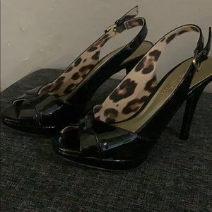 Black patent sling-back heels